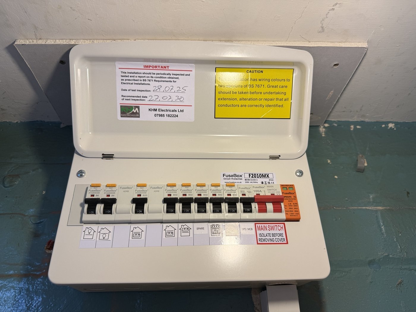 KHM electrical consumer unit with labelled circuit breakers