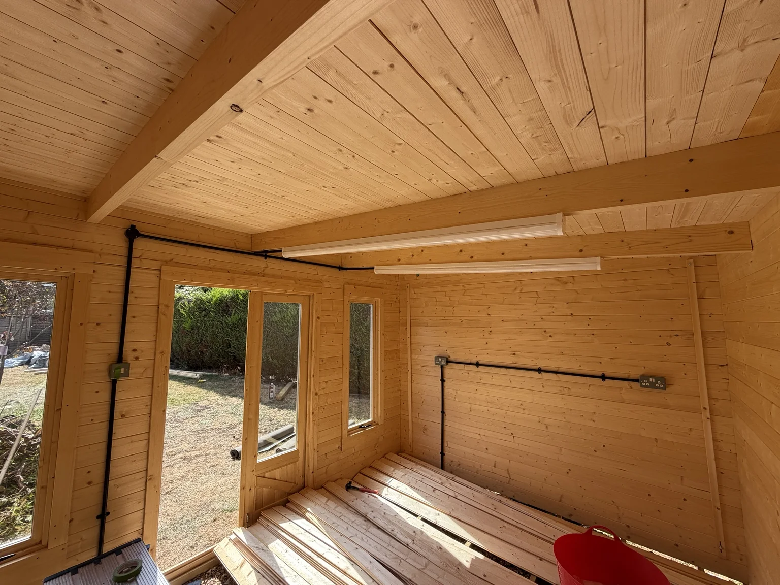 Electrical installation in a timber garden building